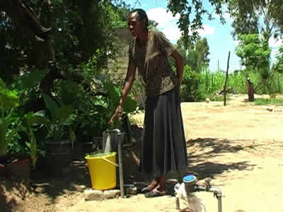 Woman with water tap